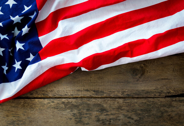 American flag on wood background