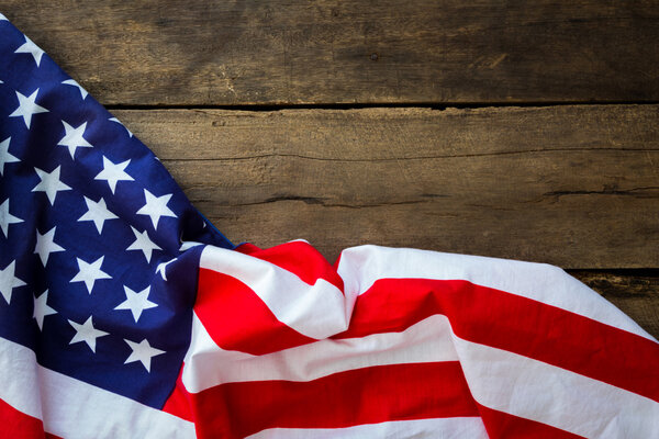 American flag on wood background