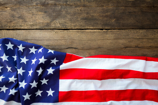 American flag on wood background
