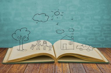 güzel aile açık bir kitap içinde el çizmek