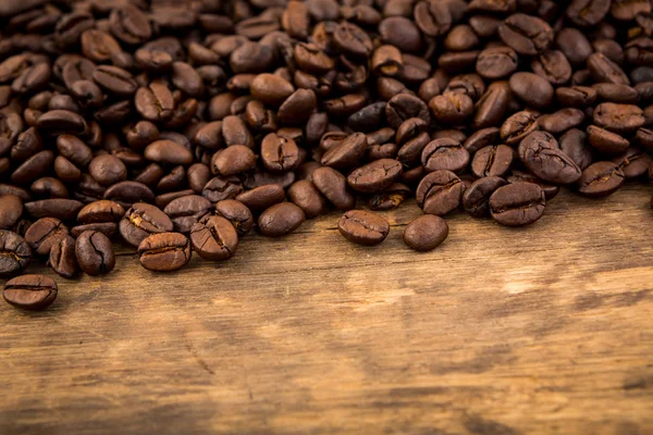 Coffee on wooden table — Stock Photo, Image