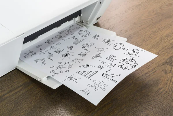 Printer met financiële documenten op een houten tafel — Stockfoto