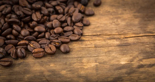 Coffee on wooden table — Stock Photo, Image