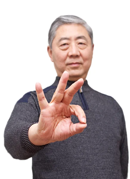 Senior asiatico uomo mostrando dito gesto — Foto Stock