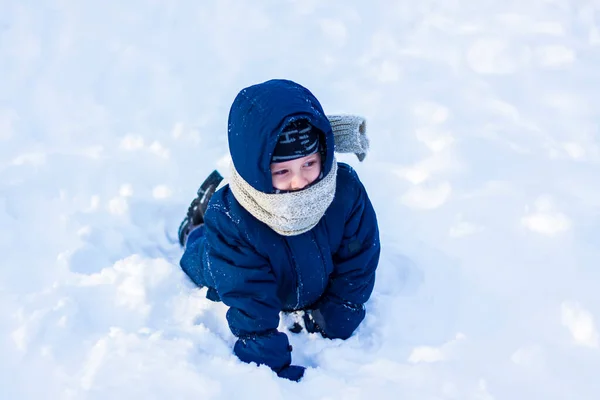 Smiling Happy Child Lies Snowdrift Sunny Winter Day Lot Snow — 图库照片