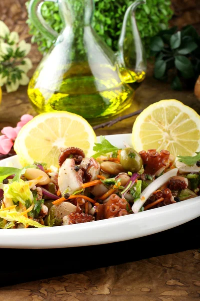 Octopus salad with vegetables and beans — Stock Photo, Image