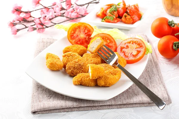 Chicken nuggets on dish — Stock Photo, Image