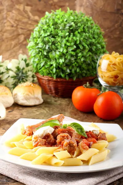 Pasta with tomato, sausage and ricotta — Stock Photo, Image