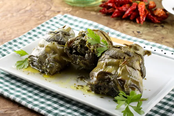 Artichokes with garlic and parsley — Stock Photo, Image