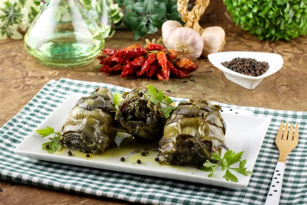 Artichokes with garlic and parsley — Stock Photo, Image