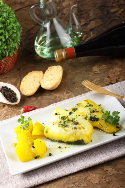 Fresh cod with potatoes and saffron — Stock Photo, Image