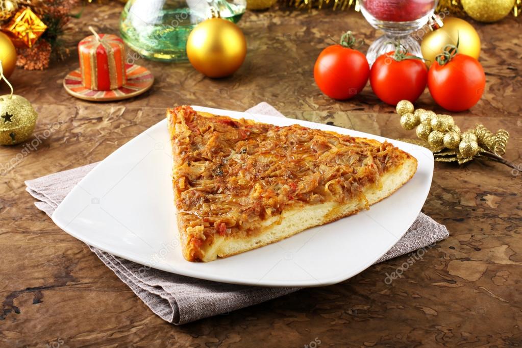 Slice of pizza with onions