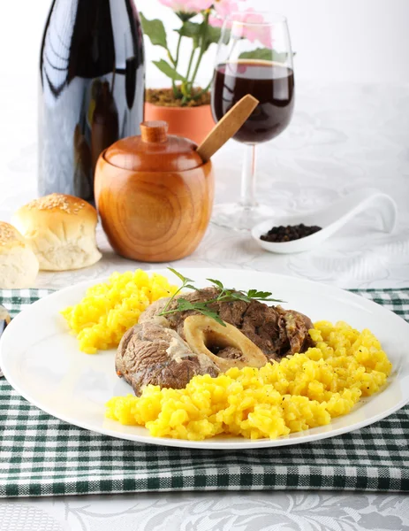 Marrowbone with saffron rice — Stock Photo, Image