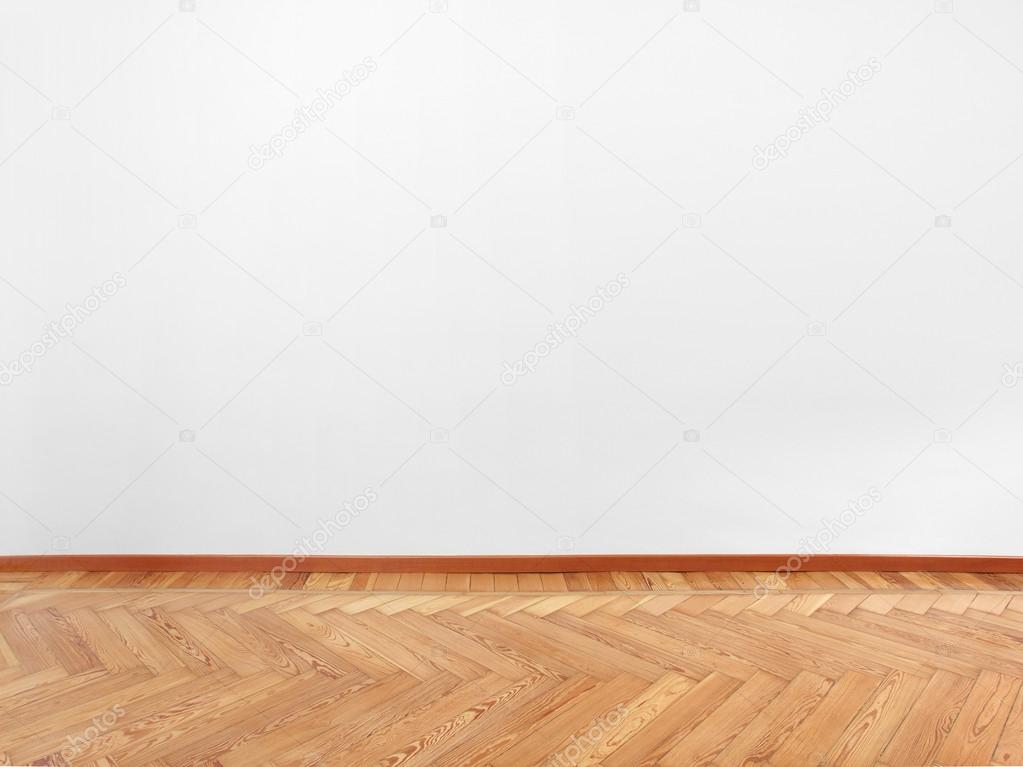 Parquet, wooden floor, and empty white wall