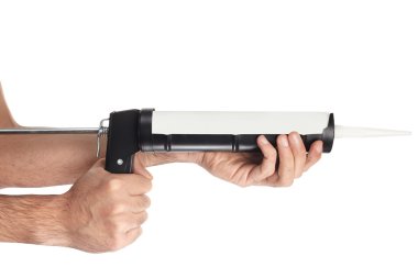 Silikon aracı silah caulking ile uygulama