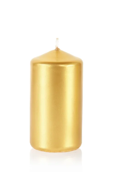 Золота свічка на білому — стокове фото