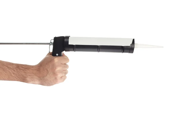 Applicazione di silicone con attrezzo pistola calafataggio — Foto Stock