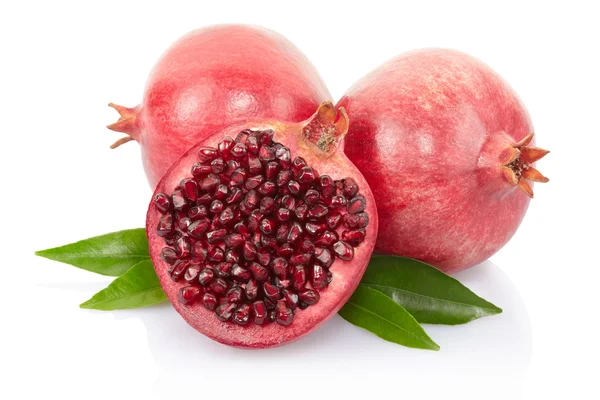 Pomegranate and half with leaves — Stock Photo, Image