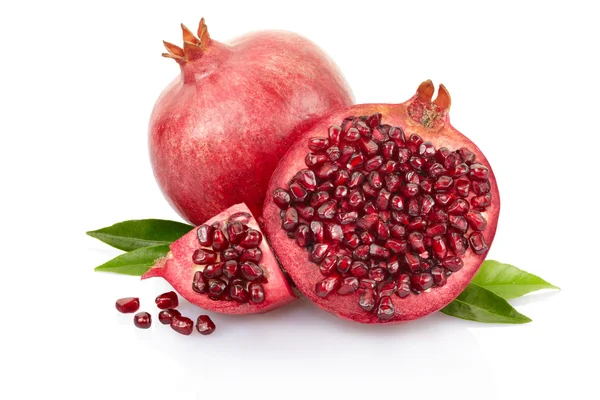 Pomegranate and half with leaves — Stock Photo, Image