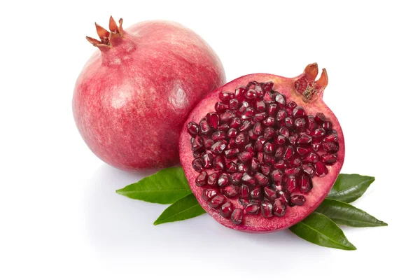 Pomegranate and half with leaves — Stock Photo, Image