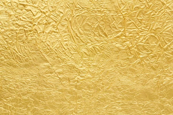 Фоновая текстура из золотой фольги — стоковое фото