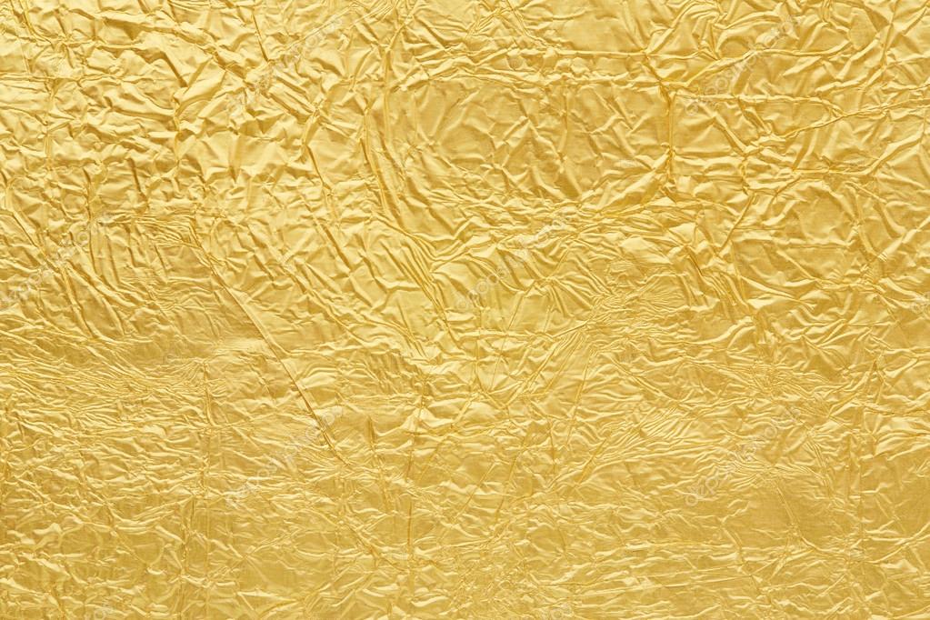 Golden foil background texture Stock Photo by ©AndreaA. 25097031