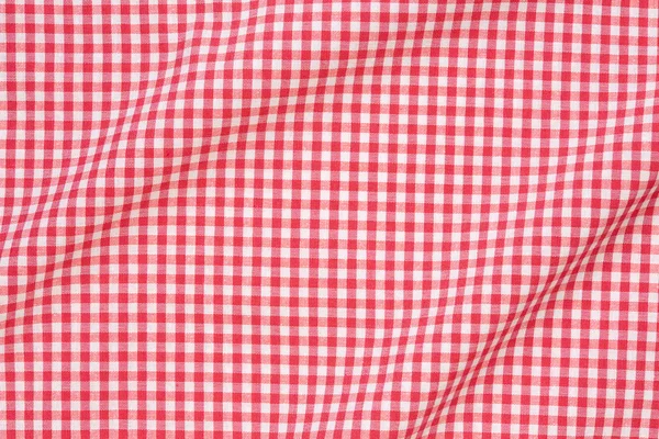 Red and white wavy gingham tablecloth texture background — Stock Photo, Image