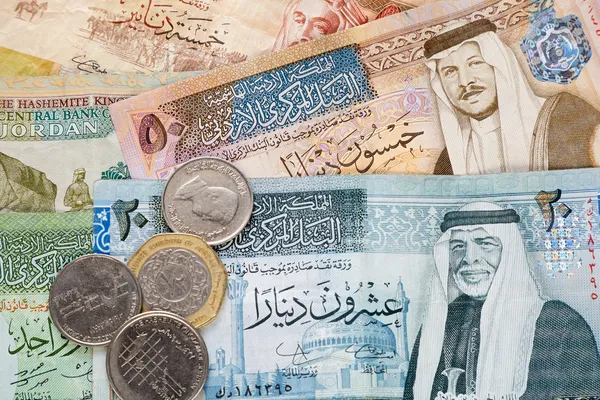 Йорданський динар фону банкноти і монети — стокове фото