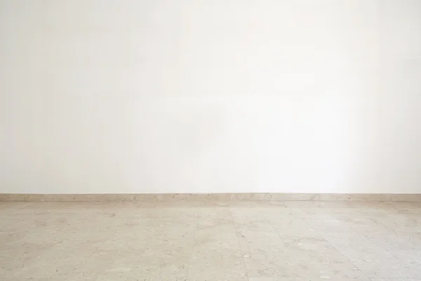 Empty room with marble floor and white wall — Stock Photo, Image