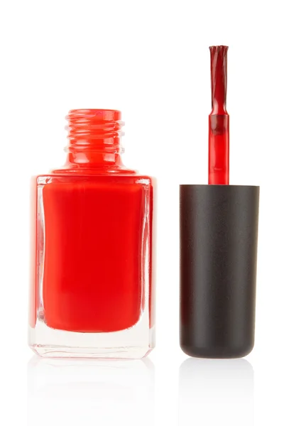 Rote Nagellackflasche mit Pinsel — Stockfoto