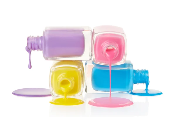 Nail polish bottles spilling — Stock Image Nail polish bottles spilling Stock Photo
