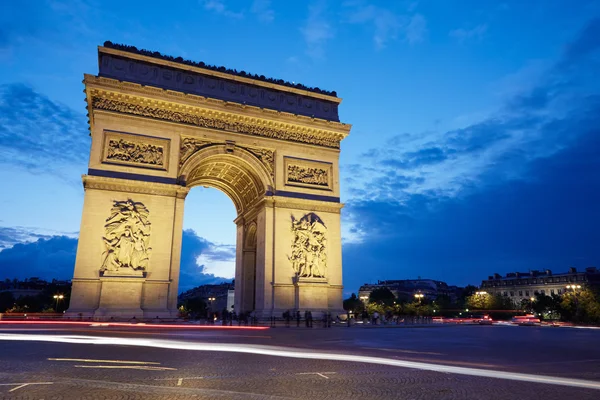 Arc de Triomphe in Paris at night Royalty Free Stock Photos