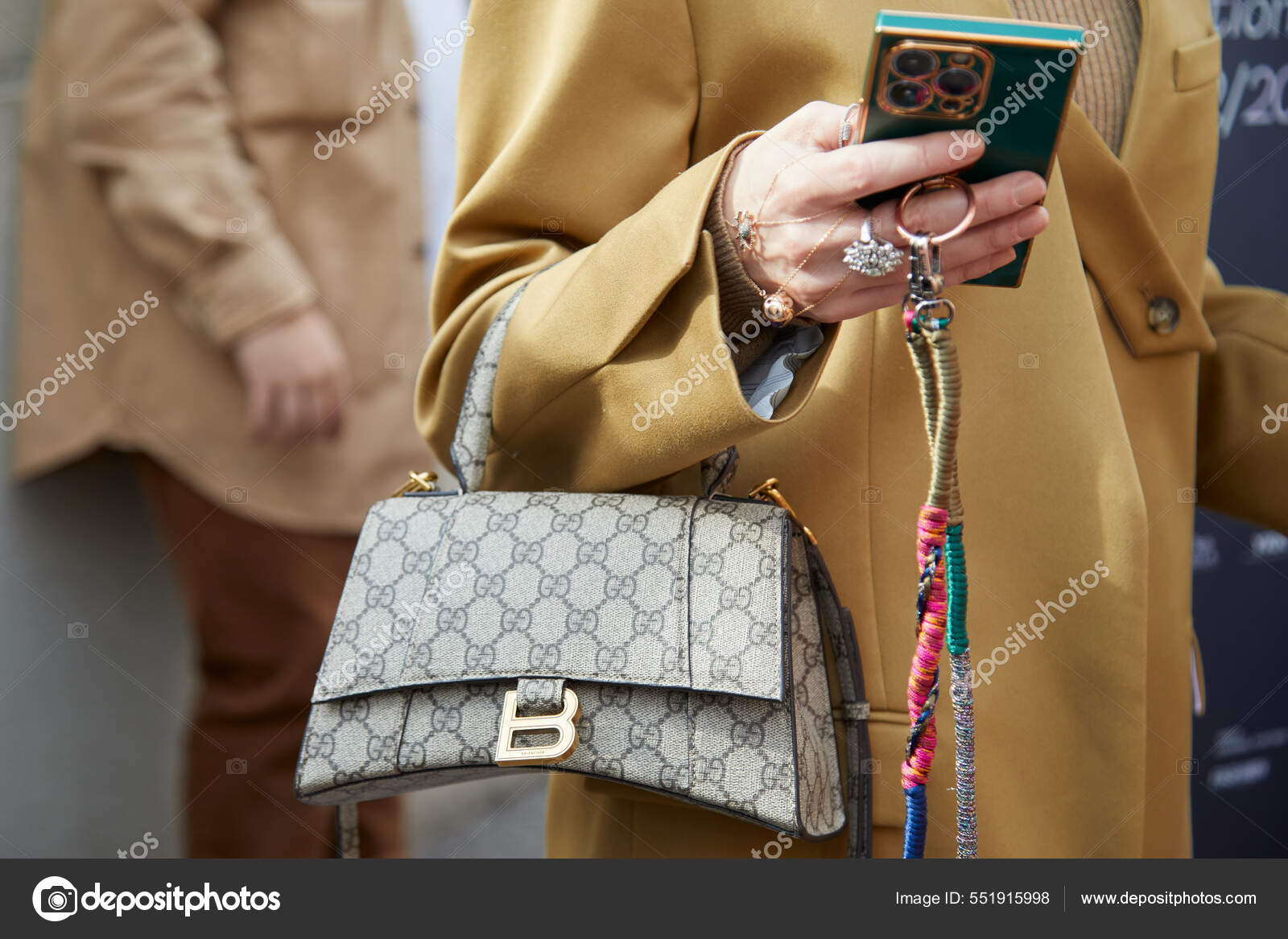 MILAN, ITALY - SEPTEMBER 22, 2018: Woman with brown Louis Vuitton