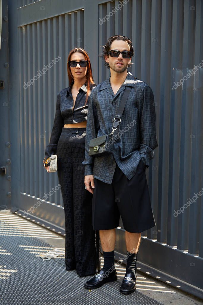MILAN, ITALY - JUNE 18, 2022: Sebastien Roques and Alice Barbier with before Fendi fashion show, Milan Fashion Week street style