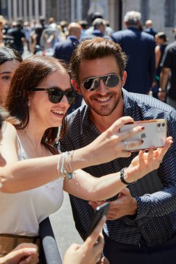 MILAN, ITALY - JUNE 20, 2022: Jonathan Bailey before Giorgio Armani fashion show, Milan Fashion Week street style