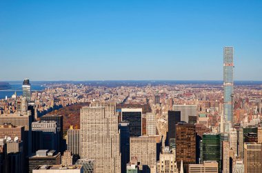 Midtown Manhattan, New York City, NY, US - November 20, 2015: aerial views of the buildings, skyscrapers and the ultra tall 432 Park Avenue tower on the right, occupying the highly developed district
