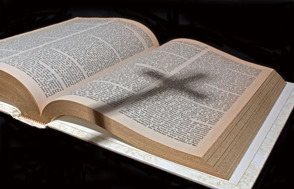 Shadow of a Cross on a Bible — Stock Photo, Image