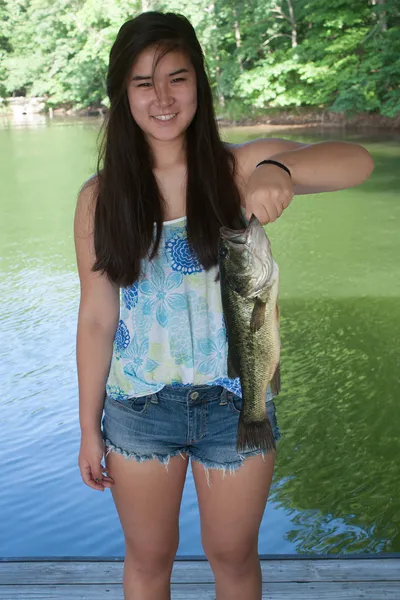Girl Holding a Largemouth Bass — Stock Photo, Image