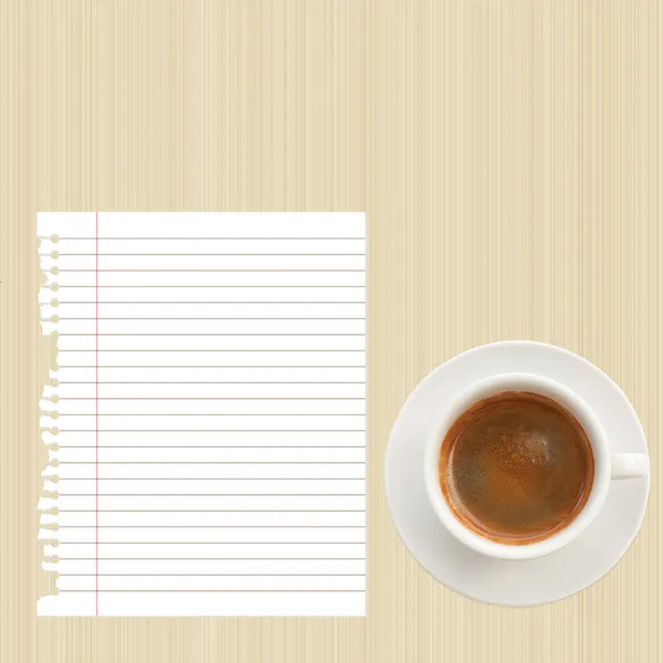 Roztrhaný papír a šálek kávy — Stock fotografie