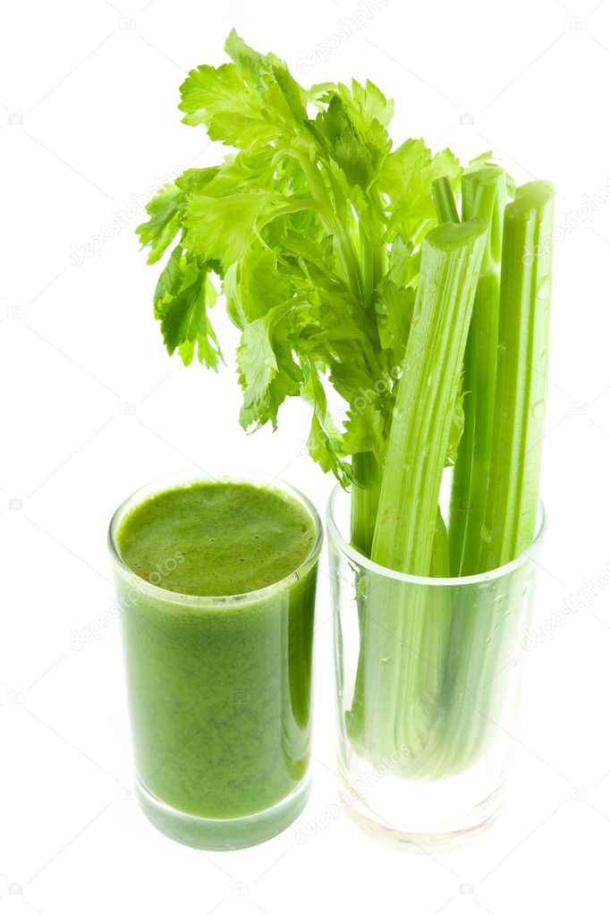 Pure fresh green celery juice in glass isolated on white backgro