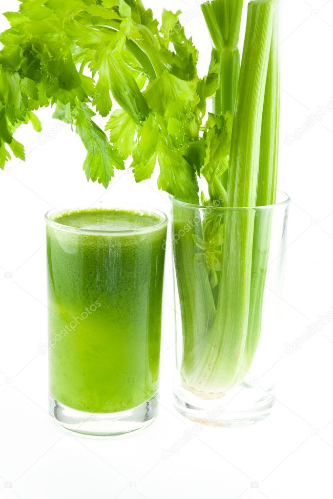 Pure fresh green celery juice in glass isolated on white backgro