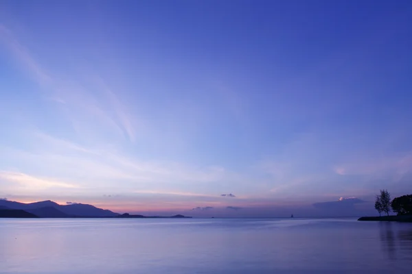 Puesta de sol en una playa — Foto de Stock