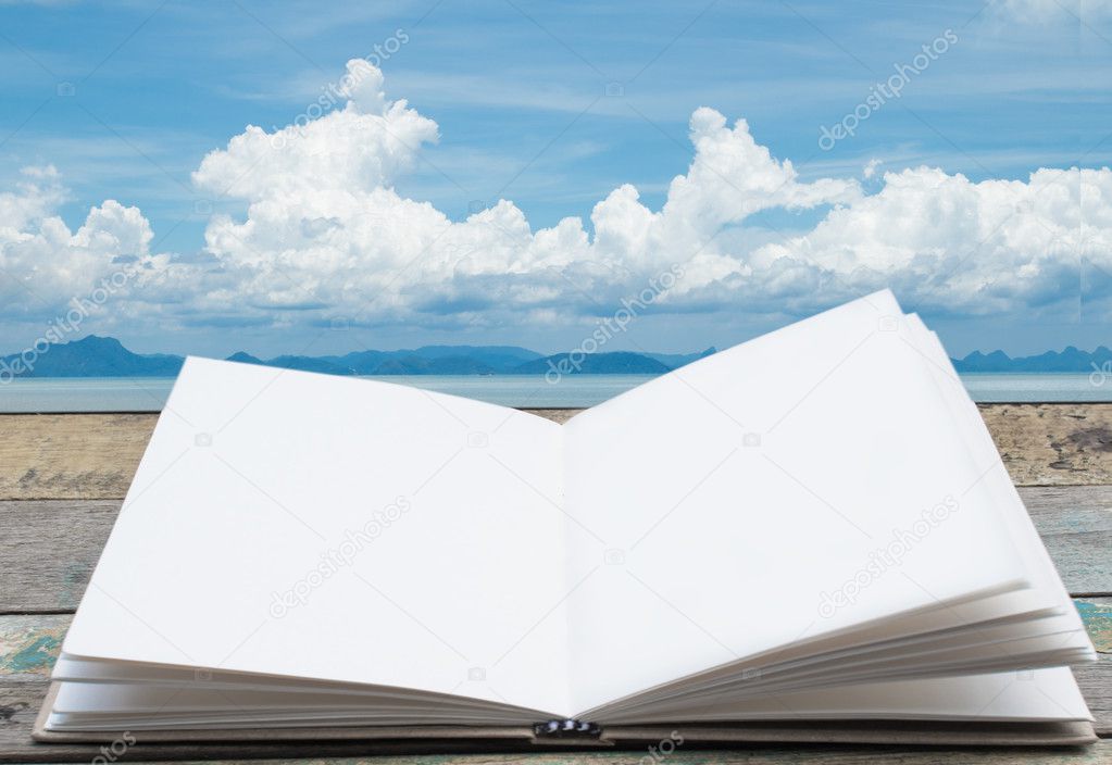 Open book and sea background