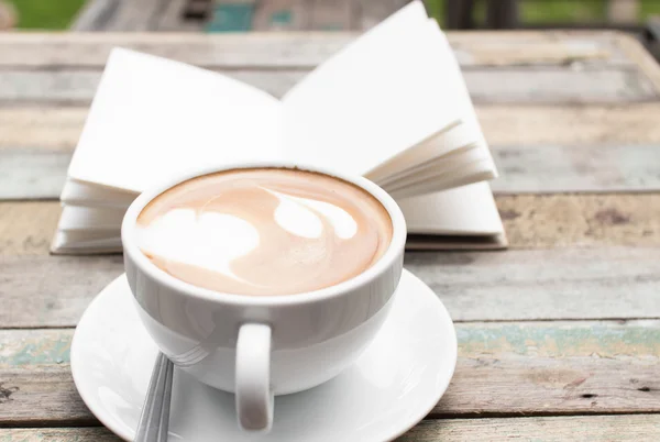 Coffee cup and notebook — Stock Photo, Image