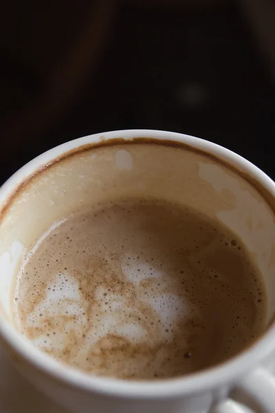 Half-empty coffee cup — Stockfoto