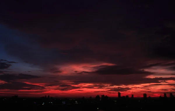 Sunset in big city — Stock Photo, Image
