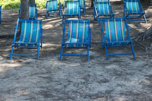 Beach chairs on sand beach — Stock Photo, Image