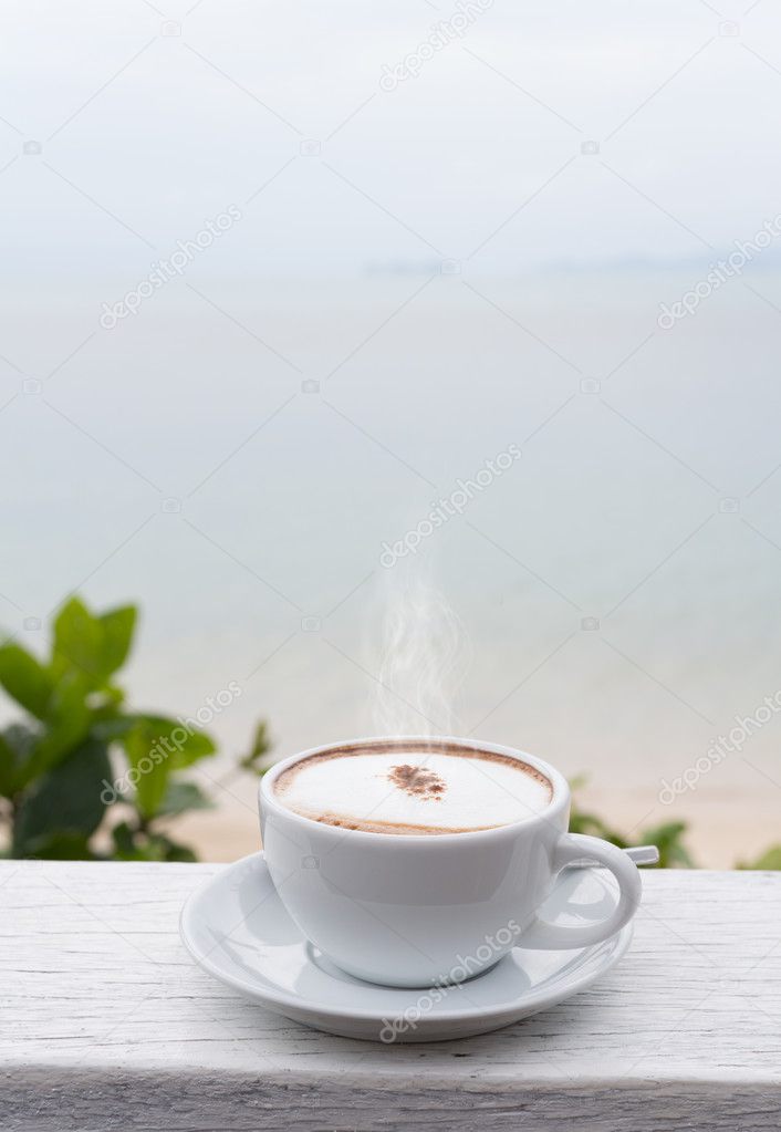 Coffee cup on grunge terrace