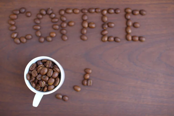 Coffee bean v bílém cup — Stock fotografie