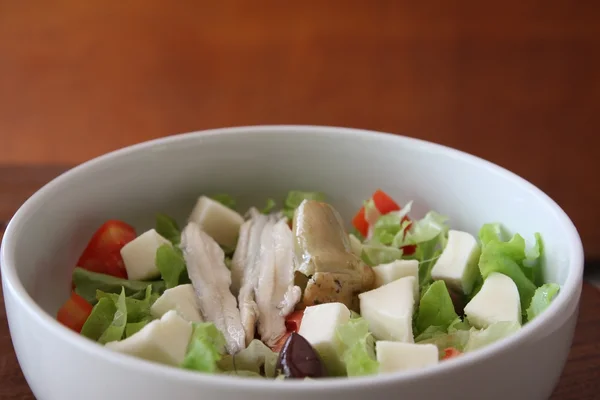 Green salad in white bow — Stock Photo, Image